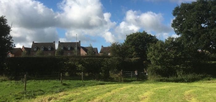 Housing at edge of town, beside fields