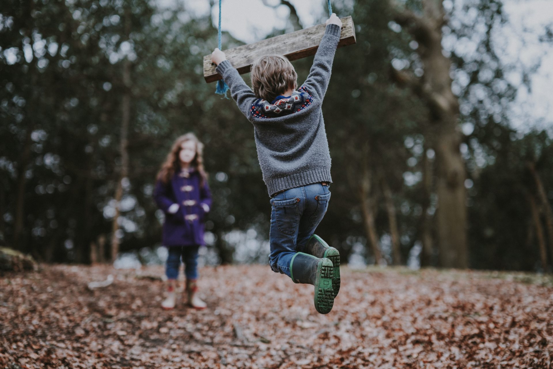 Children playing in woods